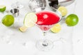 Red cosmopolitan cocktail with lime Royalty Free Stock Photo