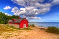 Red cottage house at the beach of Baltic sea Royalty Free Stock Photo