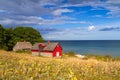 Red cottage house at the beach of Baltic sea Royalty Free Stock Photo