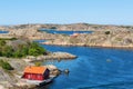 Red cottage by the sea