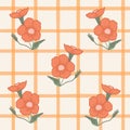 Red cottagecore plaid gingham print wallpaper with floral seamless pattern. Hand drawn doodle flowers. Royalty Free Stock Photo