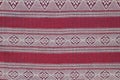 Red cotton fabric in Thai pattern for background or texture Royalty Free Stock Photo