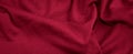 Red cotton fabric with visible details. background or textura