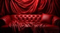 A red couch with a red curtain Royalty Free Stock Photo