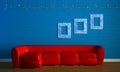 Red couch with empry frames Royalty Free Stock Photo