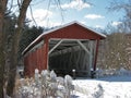 Red Covered Bridge on a sunny winter day Royalty Free Stock Photo