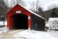 A red covered bridge in the Vermont winter Royalty Free Stock Photo