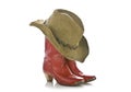 Red cowgirl boots and hat isolated Royalty Free Stock Photo