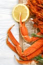 Red crab claws with a slice of lemon close-up Royalty Free Stock Photo