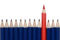 Red crayon standing out from the crowd Royalty Free Stock Photo