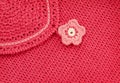 Red crochet fabric with flower button