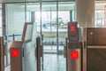 Red Cross the passage is closed sign Empty gateway terminal area in airport, closed boarding gate for check-in of passengers with