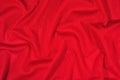 Red crumpled nonwoven fabric background Royalty Free Stock Photo