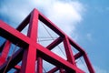 Red cube against blue sky