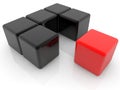 Red cube near black cubes Royalty Free Stock Photo