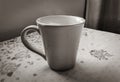 Red cup of coffee on grandmas table. Angra dos Reis Royalty Free Stock Photo