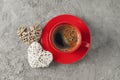 Red cup of coffee and hearts on grey background Royalty Free Stock Photo