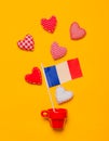 Red cup with heart shapes and flag of France Royalty Free Stock Photo