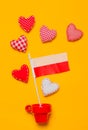 Red cup with heart shapes and flag of Poland Royalty Free Stock Photo