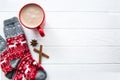 Red cup of hot chocolate and Christmas sock with ornament and de Royalty Free Stock Photo