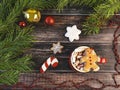 Red cup with marshmallows and gingerbread man, top view. Christmas composition with gingerbread cookies Royalty Free Stock Photo