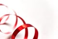 Red curly ribbon on white background Royalty Free Stock Photo