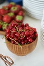 Red currant berry in a wooden bowl, close-up. Fresh currant fruit Royalty Free Stock Photo