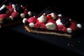 Red currant mousse and blackberry puff pastry desserts with whipped ganache and chocolate spiral decorations, section