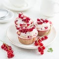 Red currant muffins with fresh berries and powdered sugar Royalty Free Stock Photo