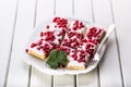 Red currant sponge cake. Plate with Assorted summer berries, raspberries, strawberries, cherries, currants, gooseberries.