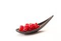 Red current on a spoon Royalty Free Stock Photo