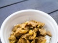 Red curry pork with rice in foam cup