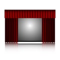 Red curtain and movie screen