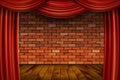 Red curtains on brick wall background. Royalty Free Stock Photo
