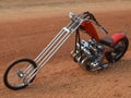 Red Custom Chopper on dirt