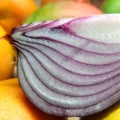Red cut raw onion close up background