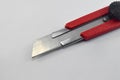 Red cutter knife isolated on white background Royalty Free Stock Photo