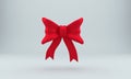 Red 3d bowknot over gray background. 3D rendering