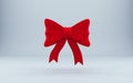 Red 3d bowknot over gray background. 3D rendering