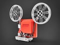 Red 3d cinema film projector isolated on gray background. 3d rendering. Royalty Free Stock Photo