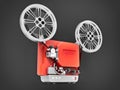 Red 3d cinema film projector isolated on gray background. 3d rendering. Royalty Free Stock Photo