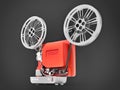 Red 3d cinema film projector isolated on gray background. 3d rendering. Royalty Free Stock Photo