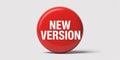 Red sphere with white text NEWVERSION on a light gray background Keywords: new version Royalty Free Stock Photo