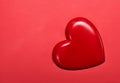 red 3d valantines heart shape on red background Royalty Free Stock Photo