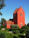 Red Danish church against clear blue sky Royalty Free Stock Photo