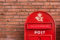 Danish mailbox on a brick wall