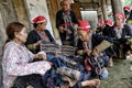 Red Dao women sewing in the village.