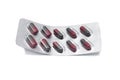 Red and dark gray capsules pill in blister pack. Royalty Free Stock Photo