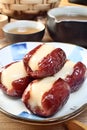 Red dates stuffed with sticky rice cake Royalty Free Stock Photo