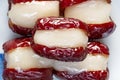 Red dates stuffed with sticky rice cake Royalty Free Stock Photo